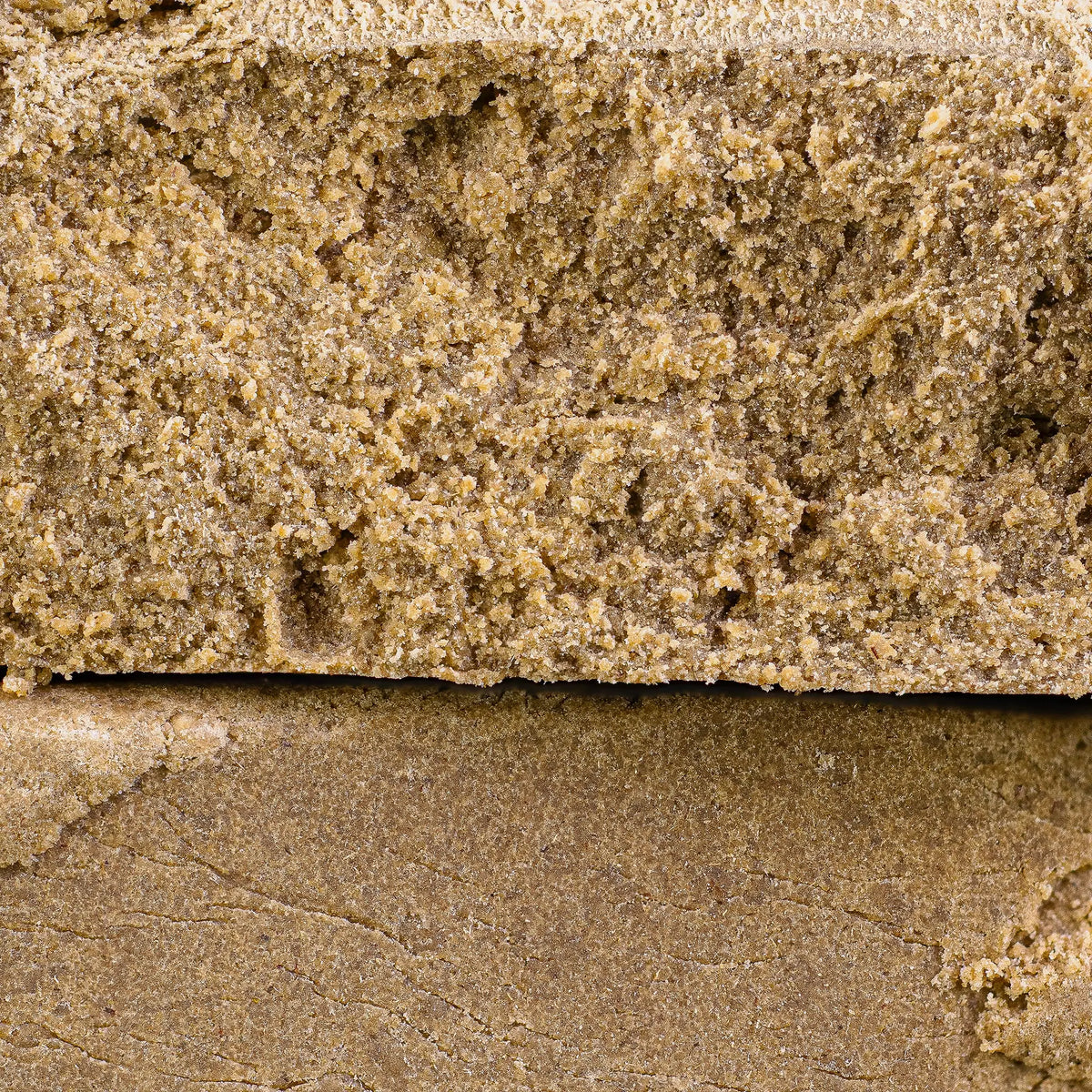 Close-up of Super Pollen THCA hash showing fine sifted resin structure