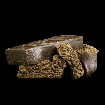 Brown hash with natural texture on a black background