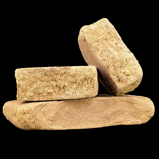 La Mousse 25% THCA dry sift hash with light golden brown texture